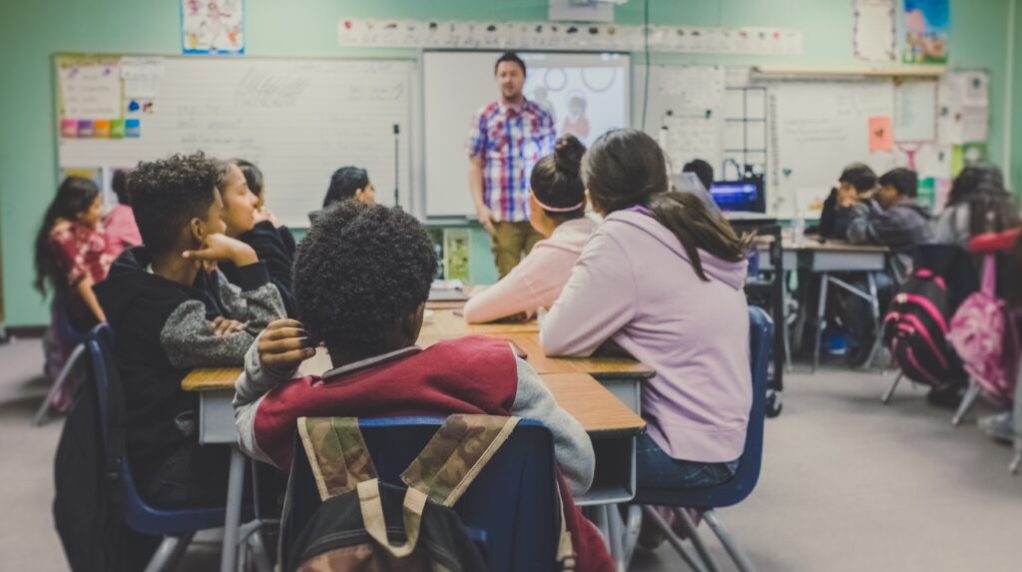 High school students listening to lecture in a classroom