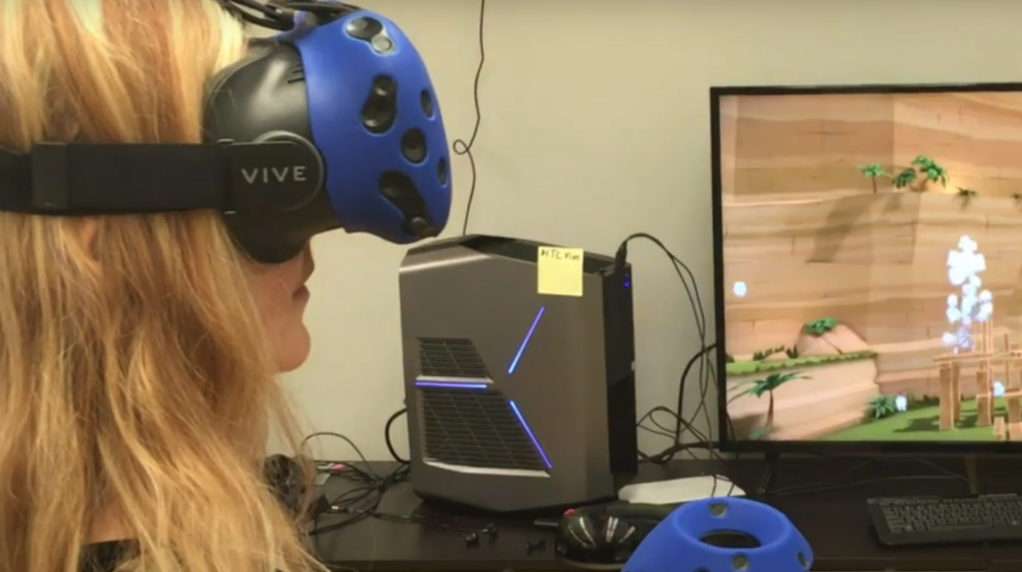 A women using a virtual reality headset.